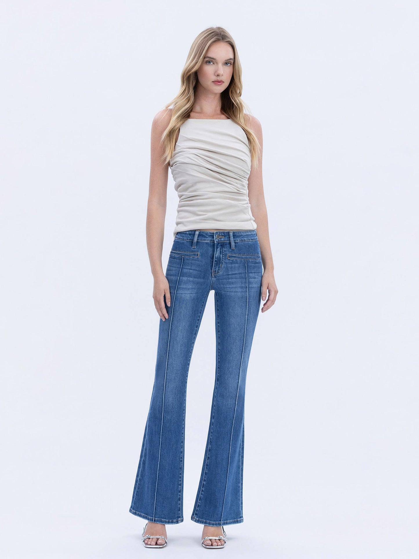 MID RISE WELT POCKET PIN TUCK FLARE JEANS