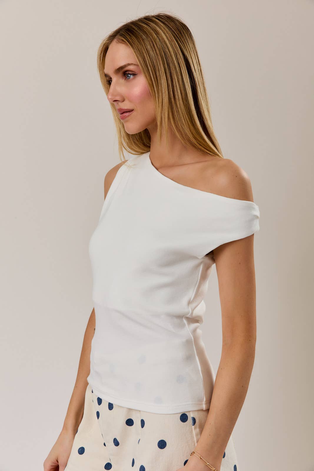 ASYMMERTRICAL NECK SLEEVELESS KNIT TOP