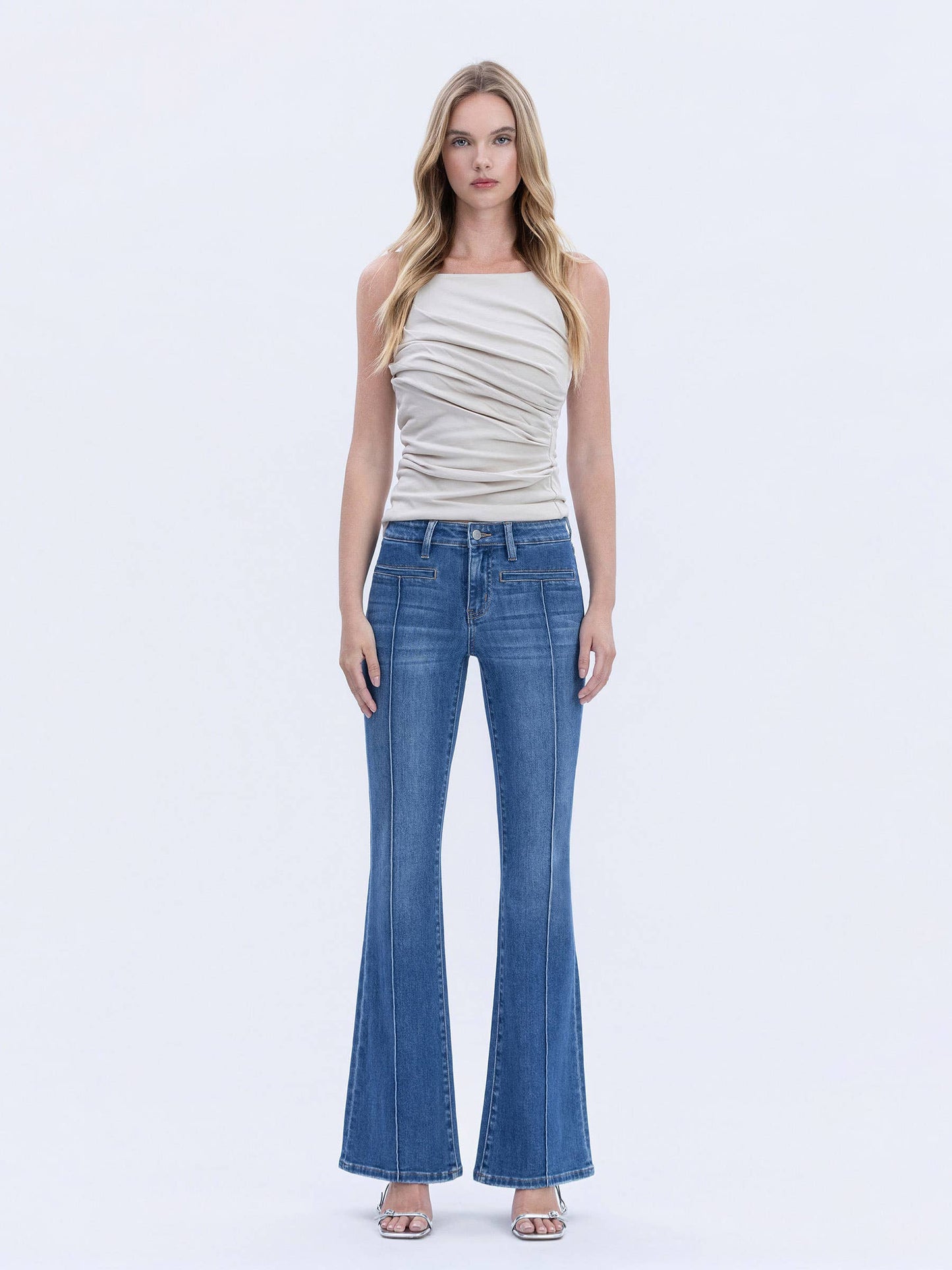 MID RISE WELT POCKET PIN TUCK FLARE JEANS