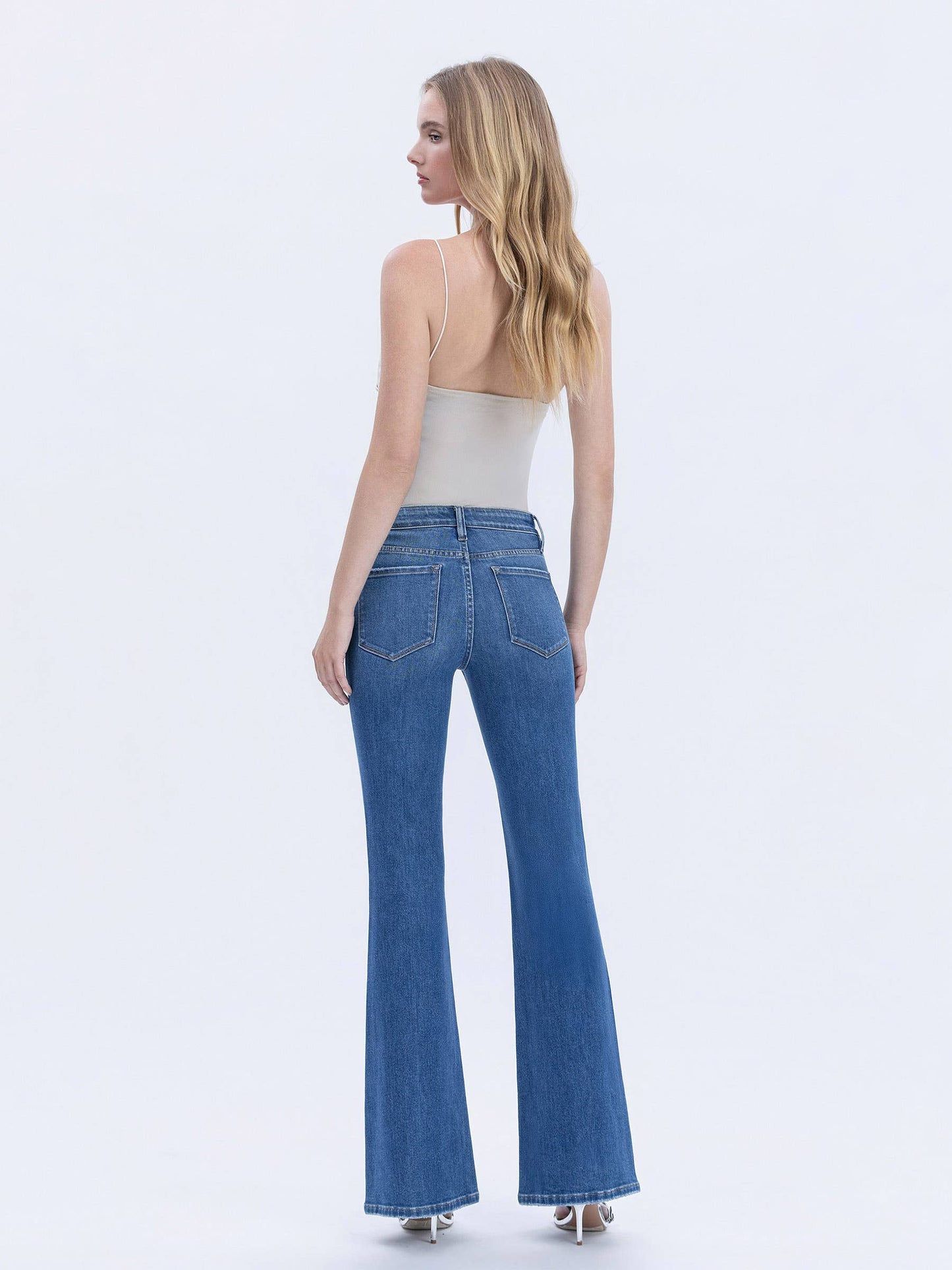MID RISE WELT POCKET PIN TUCK FLARE JEANS