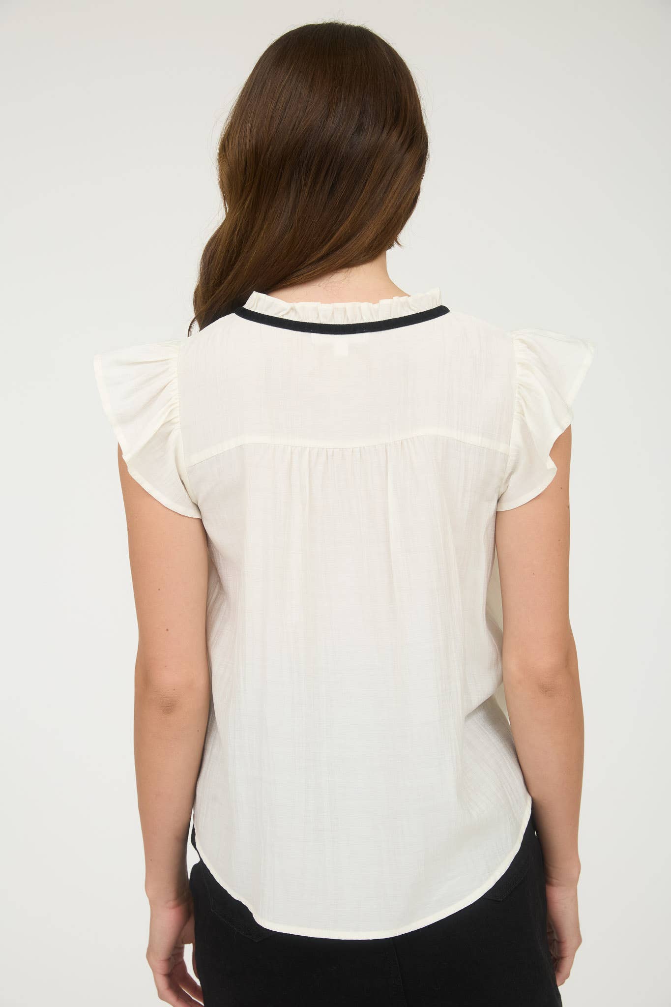 Ruffled blouse with front bow tie